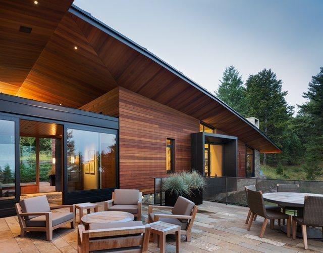 A modern house architecture design with cedar siding and soffit