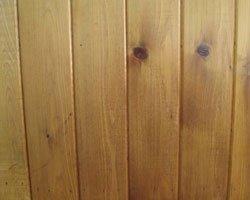 A closeup of cedar t & g tongue and groove siding